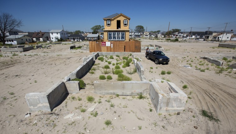 A new home under construction in Breezy Point, N.Y., where property owners are required to elevate their homes or incur drastic hikes to their insurance premiums.