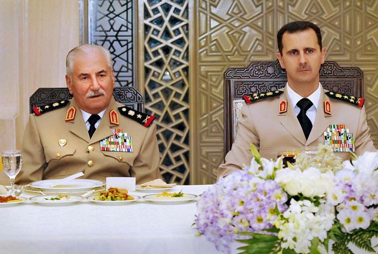 Syria's President Bashar Assad attends a dinner with former Defense Minister Gen. Ali Habib in honor of the army officers on the 65th Army Foundation anniversary in Damascus in this Aug. 1, 2010 file photo.