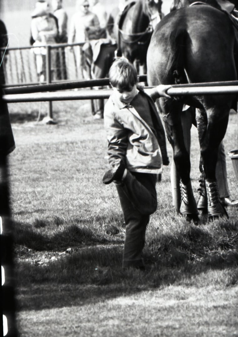 Andrew puts his foot in horse manure at a polo match in Smith's Lawn in 1968.