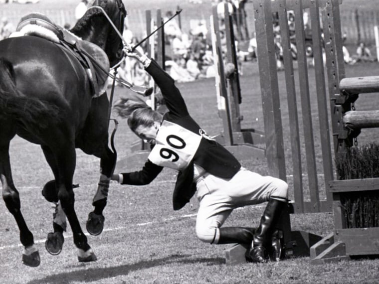 Anne takes a tumble from her horse 'Purple Star' in 1970.