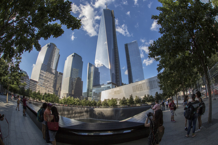 The 9/11 museum atrium as it appears between the South Pool and One World Trade Center.