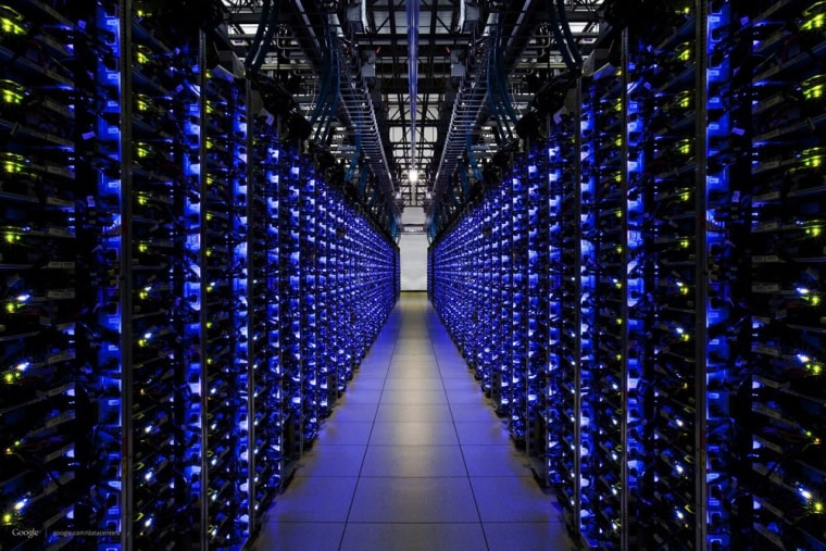 epa03439161 An undated handout photo provided by Google on 19 October 2012 shows blue LEDs on a row of servers showing that everything is running smoo...