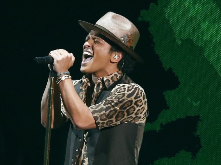 Bruno Mars performs during the 2013 MTV Video Music Awards in New York in this August 25, 2013 file photo. According to news reports The National Foot...