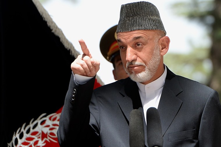 Afghan President Hamid Karzai, since in this August 21 file photo.