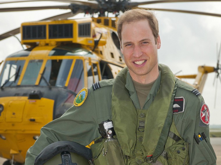 A handout file photograph shows Britain's Prince William outside his helicopter after qualifying as a search and rescue captain, in Anglesey, Wales Ju...