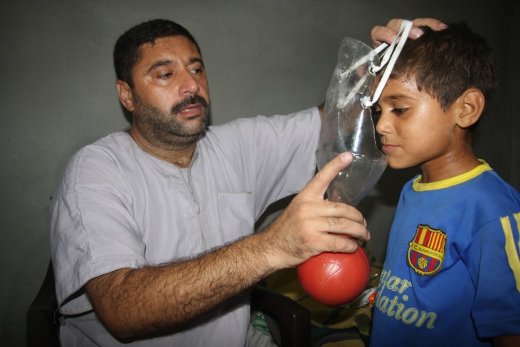 Gaza resident Nafez Nayef is making homemade gas masks for his family and friends, worried that a US strike on Syria will prompt the Assad regime to hit back at Israel with chemical weapons.