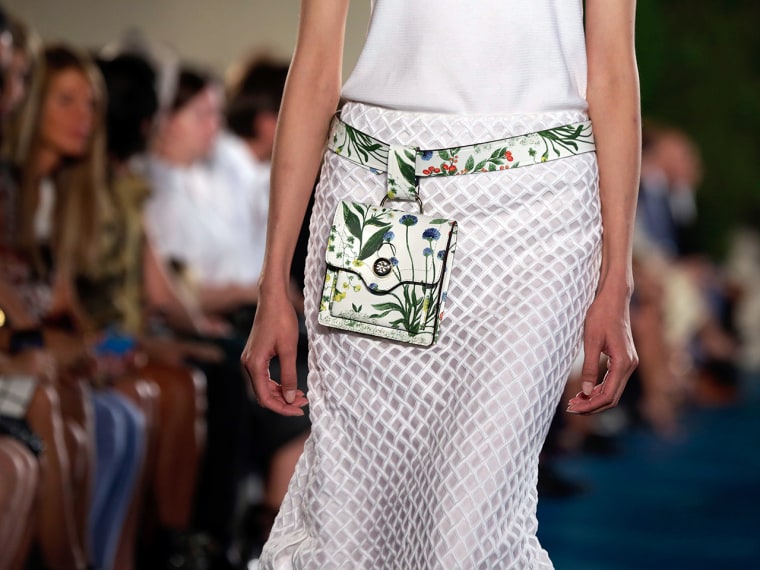 The Tory Burch Spring 2014 collection is modeled during Fashion Week in New York,  Tuesday, Sept. 10, 2013. (AP Photo/Richard Drew)
