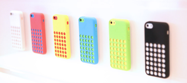 iPhone 5C cases, shown on display at the Apple iPhone launch event in Cupertino, Calif.