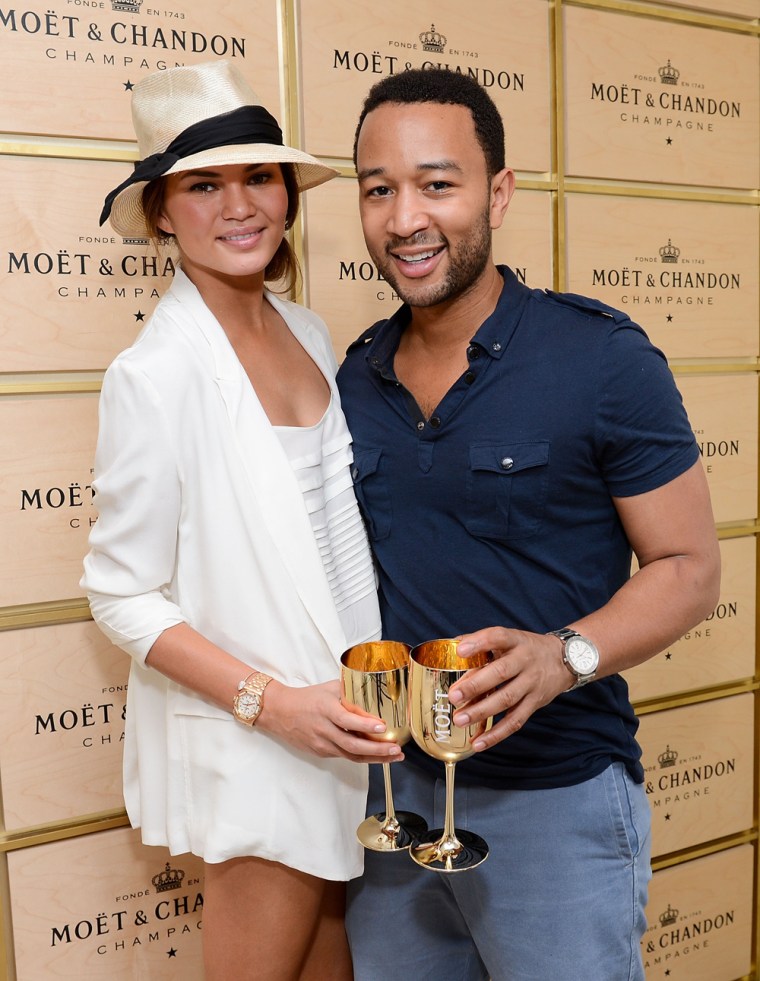 NEW YORK, NY - SEPTEMBER 02:  Model Chrissy Teigen and singer John Legend visit the Moet & Chandon Suite at the 2012 US Open at the USTA Billie Jean K...