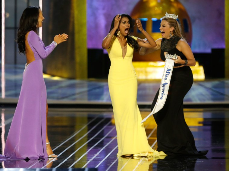 Miss New York Nina Davuluri, center, reacts after being named Miss America 2014 pageant as Miss California Crystal Lee, left, and Miss America 2013 Ma...