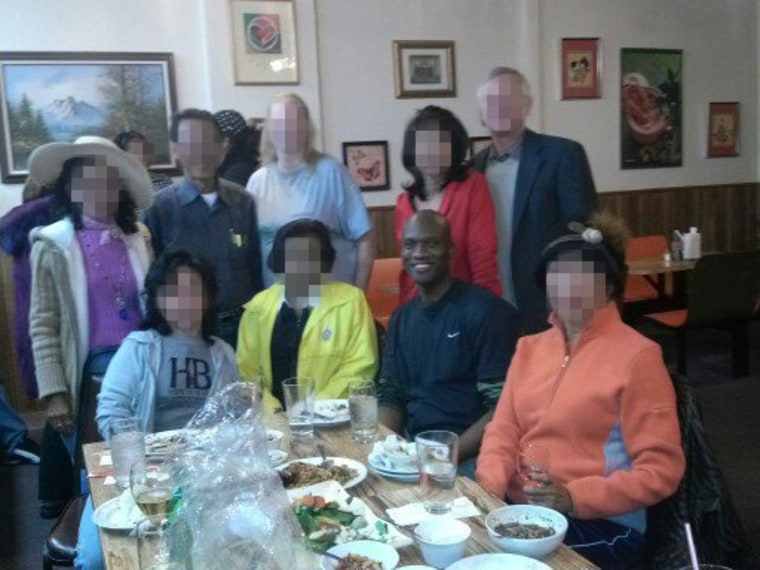 Aaron Alexis sits with other people in an undated photo. EDITOR's NOTE: All other faces except for Alexis' have been intentionally blurred.