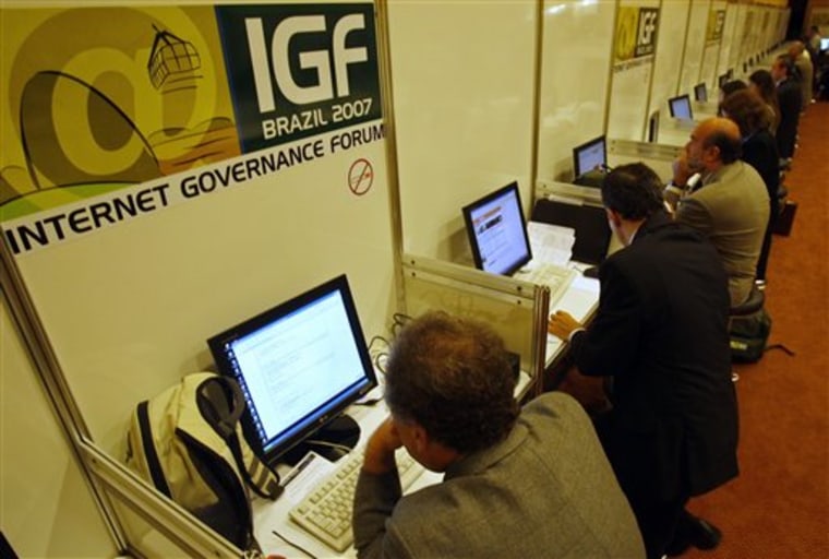 FILE - In this Nov. 12, 2007 file photo, people uses the internet during the Internet Governance Forum in Rio de Janeiro, Brazil. President Dilma Rous...