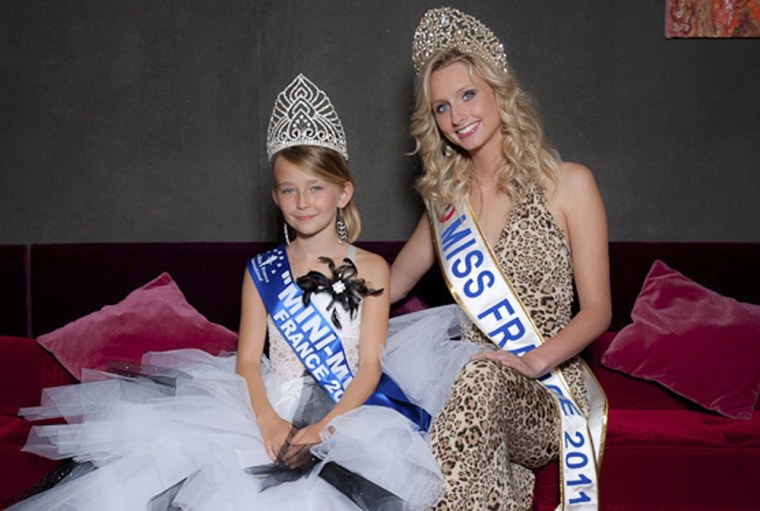 Oceane Scharre, 10, elected Mini Miss France 2011, left, and Miss France 2011 Mathilde Florin.