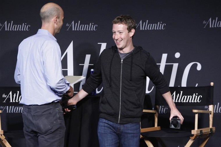 Facebook CEO Mark Zuckerberg (R) takes his seat for an onstage interview for with James Bennet (L) of the Atlantic Magazine in Washington, September 1...