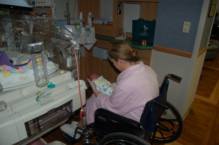 Carolyn Savage in the NICU with her second child, Ryan.