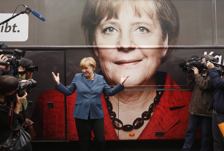 German Chancellor Angela Merkel stands in front of her election campaign tour bus before a Christian Democratic Union board meeting in Berlin on Monday.
