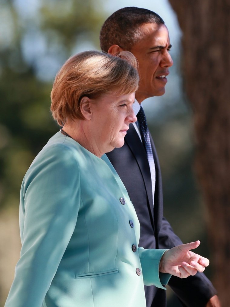 President Barack Obama and German Chancellor Angela Merkel attend a family picture event during the G20 Summit in St. Petersburg, Russia, on September 6, 2013.