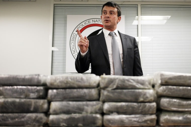French Interior Minister Manuel Valls holds a news conference about 1.3 tons of cocaine seized by French police, on Sept. 21, 2013 in Nanterre, France. Valls announced 1.3 tons of pure cocaine was found on board an Air France cargo plane on Sept 11, 2013.