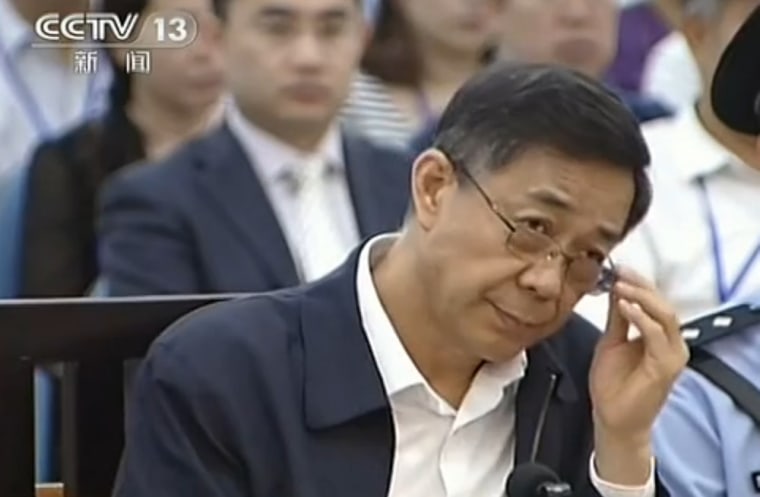 This screen grab taken from CCTV footage released on Aug. 26, shows ousted Chinese political star Bo Xilai looking on as he stands on trial in the Intermediate People's Court in Jinan, east China's Shandong province.