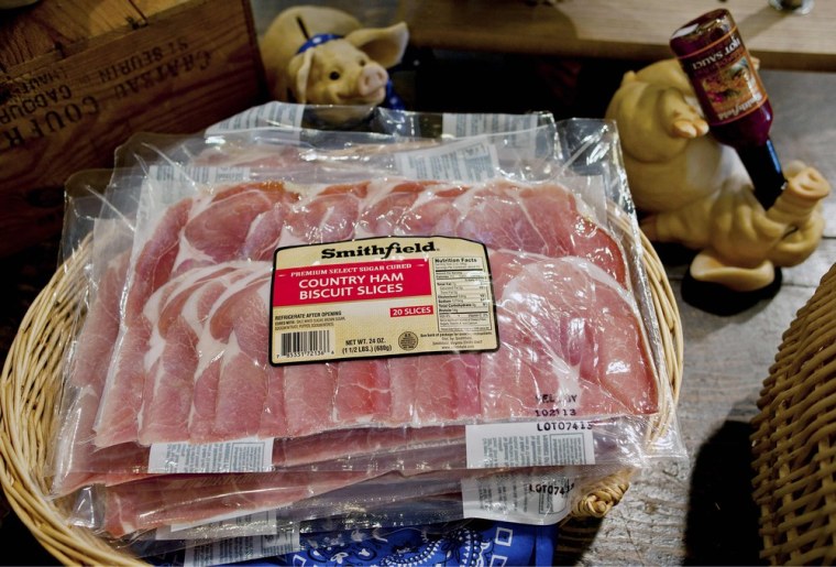 Smithfield ham slices are on sale at the Taste of Smithfield restaurant and gourmet market in Smithfield, Virginia in this file photo taken May 30, 20...