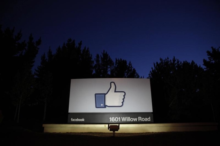 The sun rises behind the entrance sign to Facebook headquarters in Menlo Park before the company's IPO launch, May 18, 2012. REUTERS/Beck Diefenbach