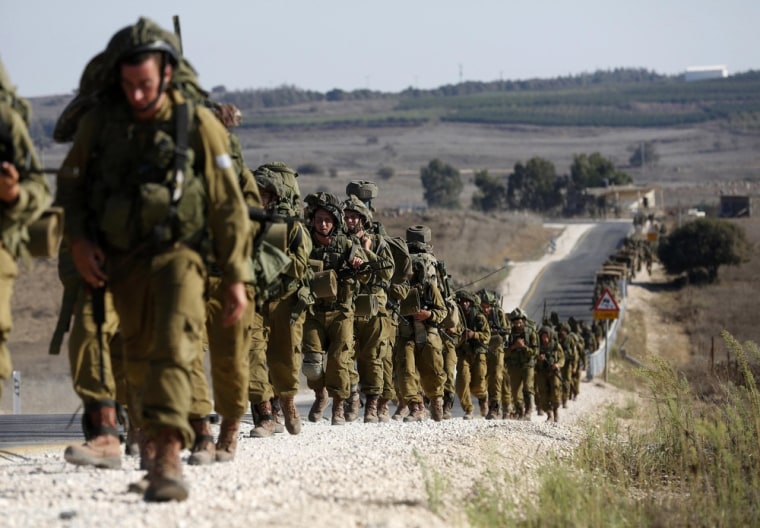 Israeli soldiers from the paratroopers brigade take part in a drill in the Israeli-occupied Golan Heights, near the border with Syria on Sept. 9.
