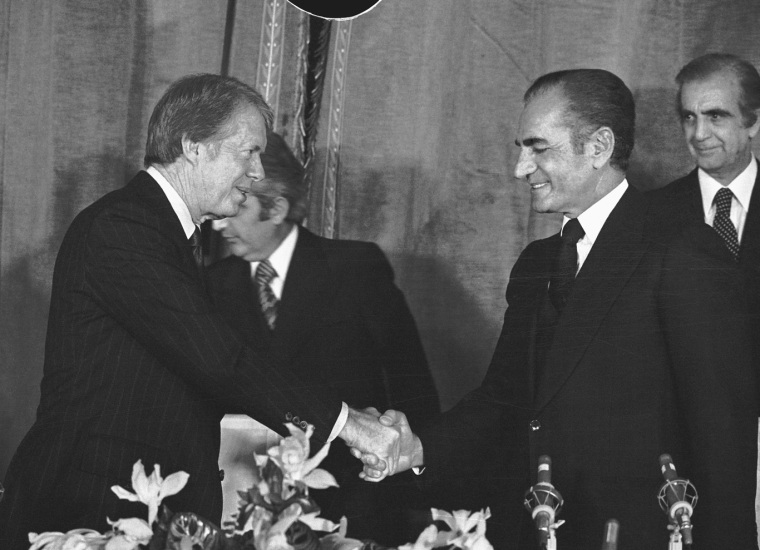 Shah Mohammad Reza Pahlovi, the embattled shah of Iran, shakes hands with President Jimmy Carter on Dec. 31, 1977, in Tehran. The shah was overthrown by the Iranian Revolution in Feb. 1979.