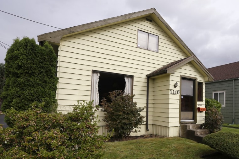 The childhood home of Kurt Cobain, the late frontman of Nirvana, left, in Aberdeen, Wash.