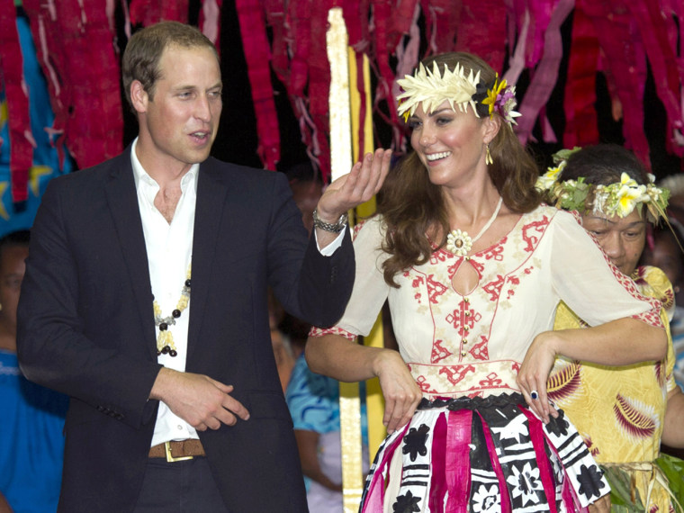 TUVALU - SEPTEMBER 18: Prince William, Duke of Cambridge and Catherine, Duchess of Cambridge dance with the ladies at the Vaiku Falekaupule for an ent...