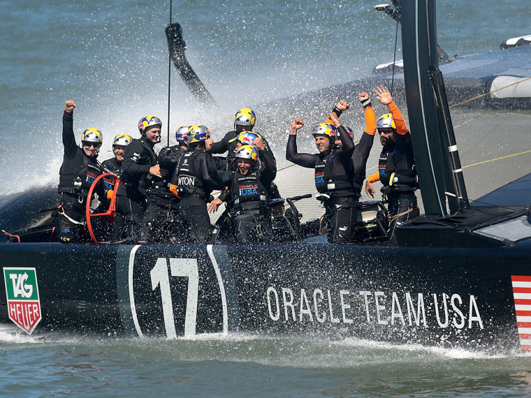 TOPSHOTS
Oracle Team USA celebrates defeating Emirates Team New Zealand in the 34th America's Cup on September 25, 2013, in San Francisco. Oracle Team...