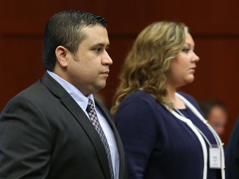 George Zimmerman, left, arrives in Seminole circuit court, with his wife Shellie, in Sanford, Fla., Monday, June 24, 2013. Zimmerman is accused in the...