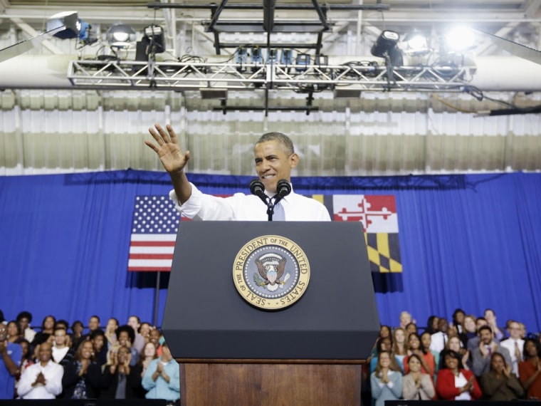 President Barack Obama waves to people in the crowd before speaking about the Affordable Care Act, Thursday, Sept. 26, 2013, at Prince George's Community College in Largo, Md.
