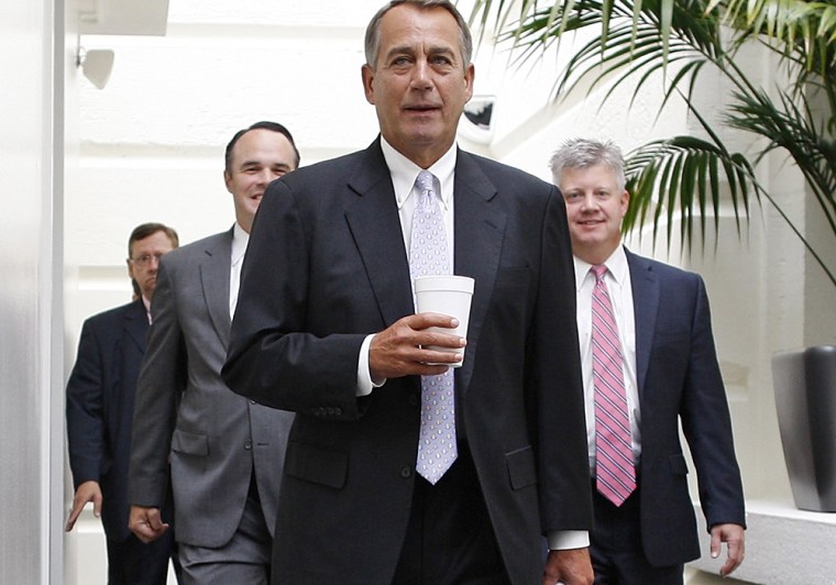House Speaker John Boehner arrives for a closed-door meeting of the House Republican caucus Saturday.