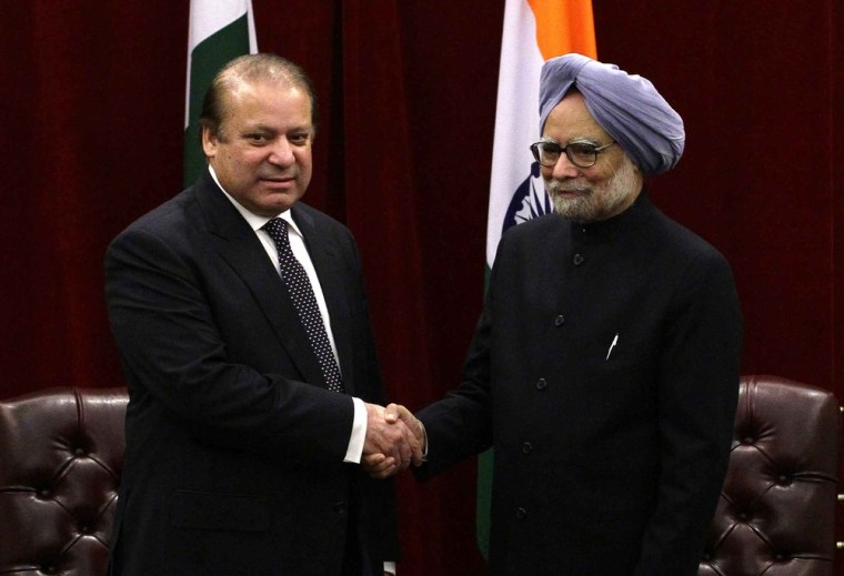 Pakistan's Prime Minister Nawaz Sharif, left, shakes hands with India's Prime Minister Manmohan Singh, right, during the United Nations General Assembly at the Plaza Hotel in New York on Sunday.
