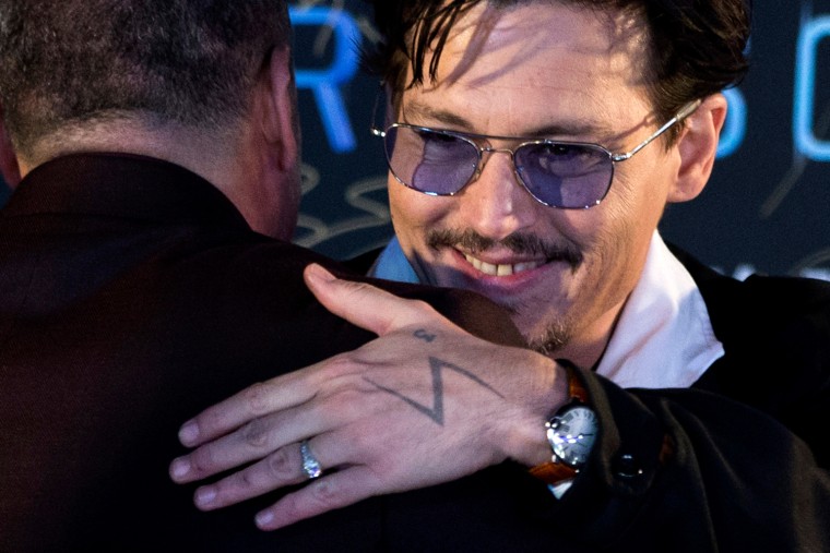 IMAGE: Depp wearing ring