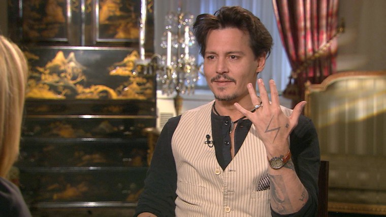 Depp showed off his ring to Savannah.