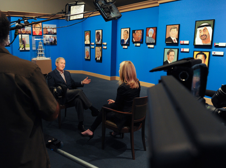 President George W. Bush chats with daughter Jenna Bush Hager in Dallas, Texas. Photo by Grant Miller