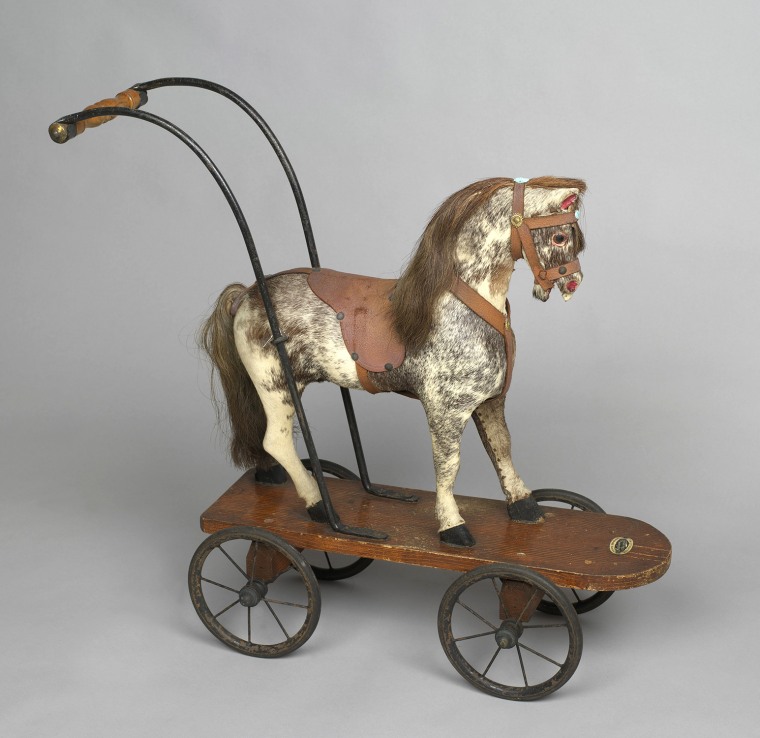A toy horse on wheels that Princess Elizabeth and Princess Margaret played with, c.1930s
<br/>
<br/>Credit line: Royal Collection Trust / (C) Her Maje...