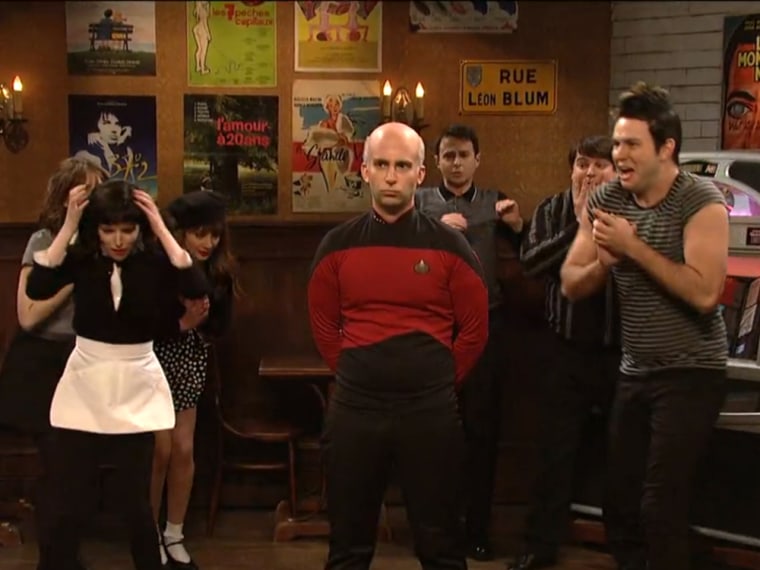 Image: the cast of \"Saturday Night Live,\" along with host Anna Kendrick, welcome Capt. Jean-Luc Picard.