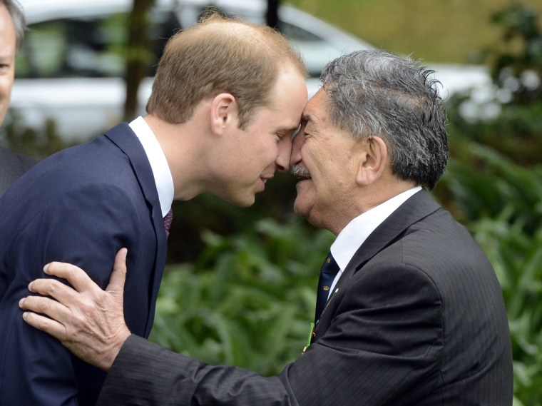 Britain's Prince William, left, receives a hongi, a traditional Maori welcome,  from Maori Elder Lewis Moeau, at the official welcome ceremony for Wil...