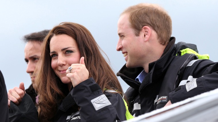 epa04163181 Britain's Prince William and Catherine, Duchess of Cambridge, smile at the Viaduct Harbour before going sailing with Team New Zealand in t...