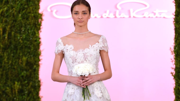 NEW YORK, NY - APRIL 11:  A model walks the runway at the Oscar De La Renta Spring 2015 Bridal collection show on April 11, 2014 in New York City.  (P...