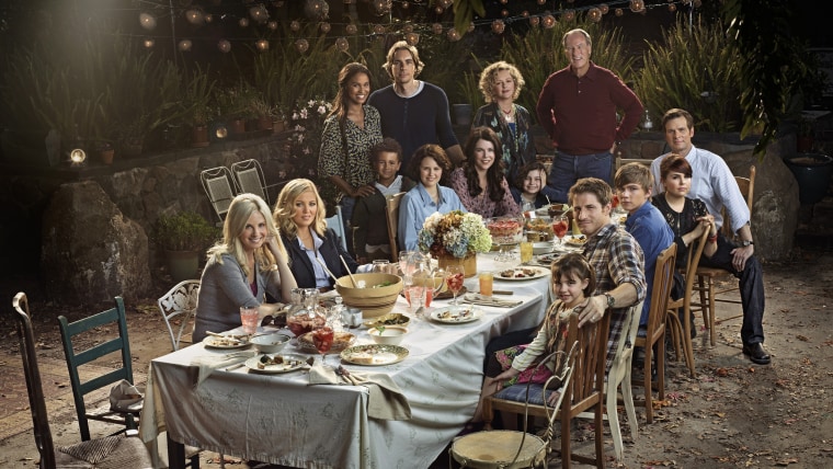 The \"Parenthood\" cast sits in the grandparents' magical outdoor dining area.