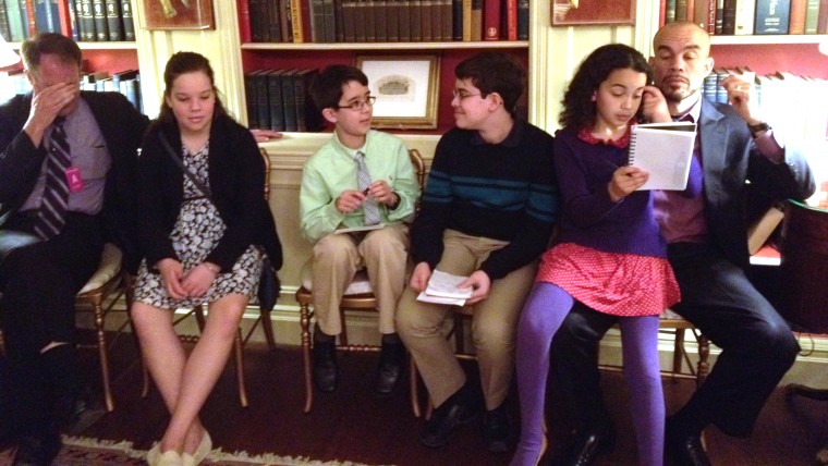 Kid reporters wait in the White House library to speak to the first lady.