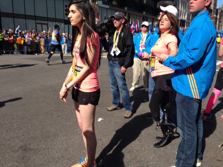 Celeste and Sydney Corcoran waiting to retake the finish line on Monday.