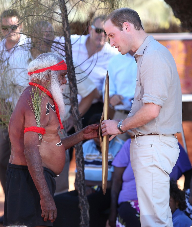 AYERS ROCK, AUSTRALIA - APRIL 22:  Prince William, Duke of Cambridge meets an indigenous man during a visit to Uluru-Kata Tjuta Cultural Centre on Apr...