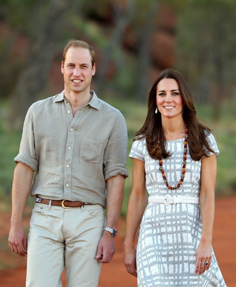 AYERS ROCK, AUSTRALIA - APRIL 22:  Catherine, Duchess of Cambridge and Prince William, Duke of Cambridge walk down Kuniya Walk at the base of Uluru on...