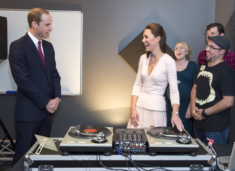 ADELAIDE, AUSTRALIA - APRIL 23:  Catherine, Duchess of Cambridge and Prince William, Duke of Cambridge laugh as they are shown how to play on DJ decks...