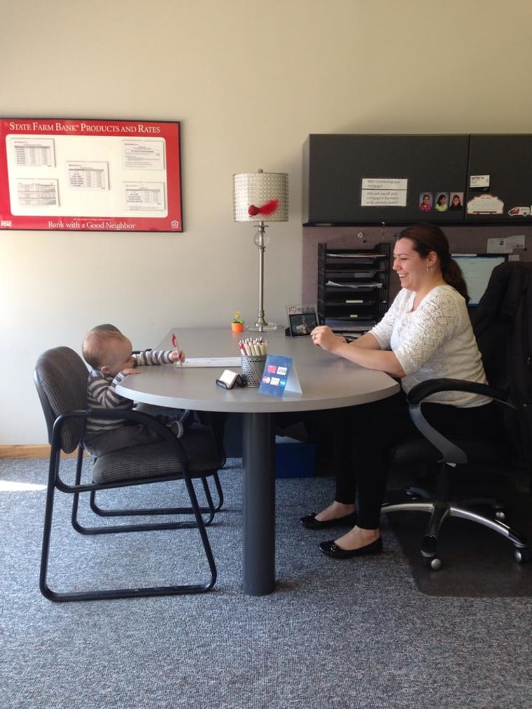 14-month-old Cooper visiting his State Farm Agent mom at work. He was getting coached by one of mom's office associate's.