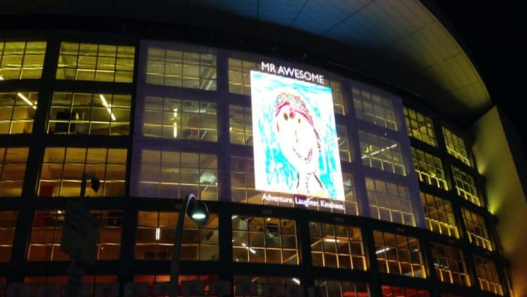 The \"Mr. Awesome\" self portrait drawn by Calder Sloan appeared on the side of American Airlines Arena, the home of the defending NBA champion Miami Heat.